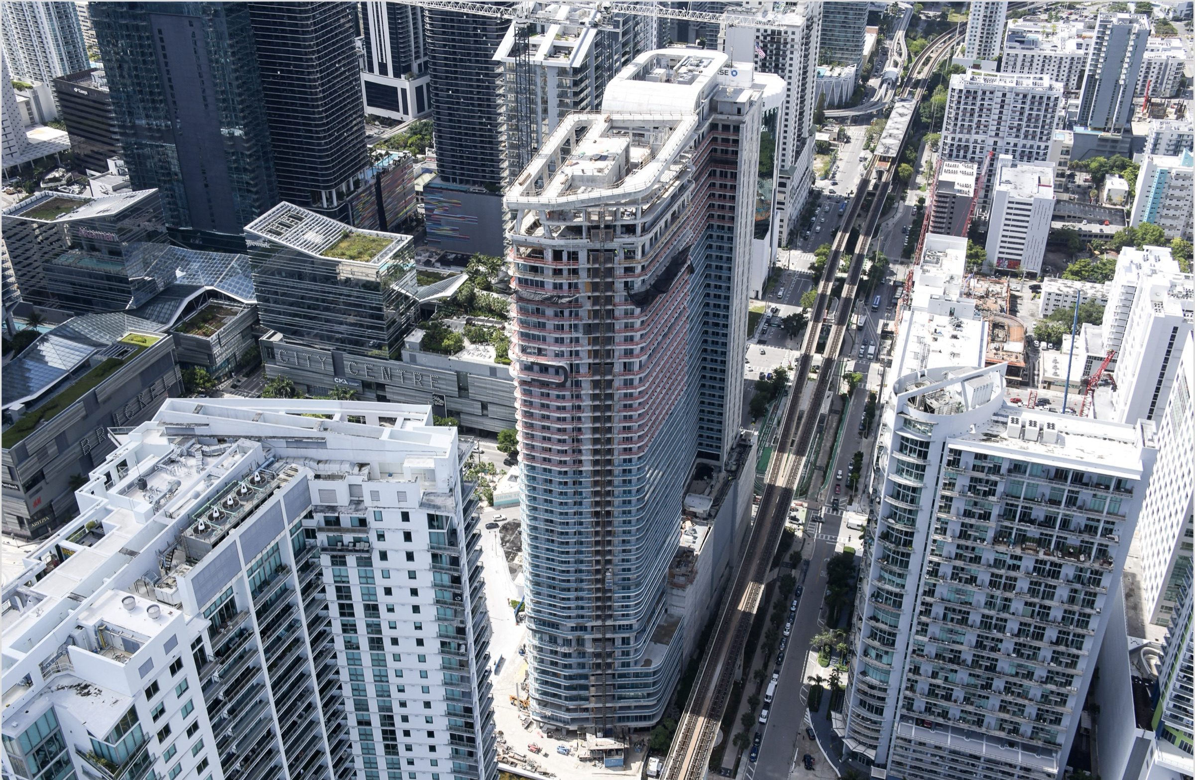 Construction aerial, May 2026: the tower in the Brickell skyline